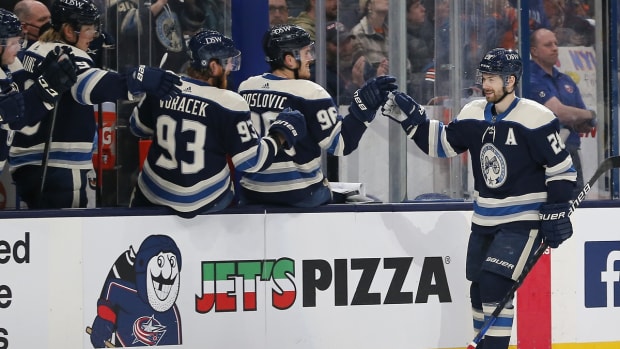 Mar 29, 2022; Columbus, Ohio, USA; Columbus Blue Jackets right wing Oliver Bjorkstrand (28) celebrates a goal against the New York Islanders during the third period at Nationwide Arena. Mandatory Credit: Russell LaBounty-USA TODAY Sports